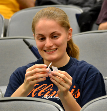 Gathering for Gardner attendee folds a hexahexaflexagon