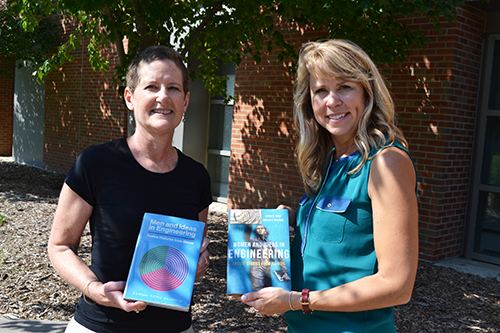 Laura Hahn and Angie Wolters (right) with their book<em> Women and Ideas in Engineering: Twelve Stories from Illinois</em>.
