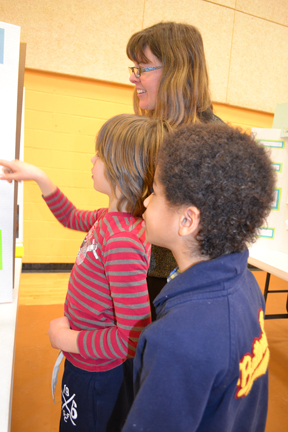 Two Next Generation students discuss their work with Illinois judge Kara Federmeier.