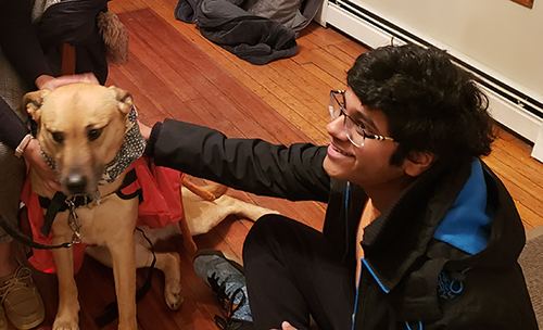 Suva Narayan (right) and Penny, as she waits to undergo testing. (Image courtesy of Joseph Sim.)