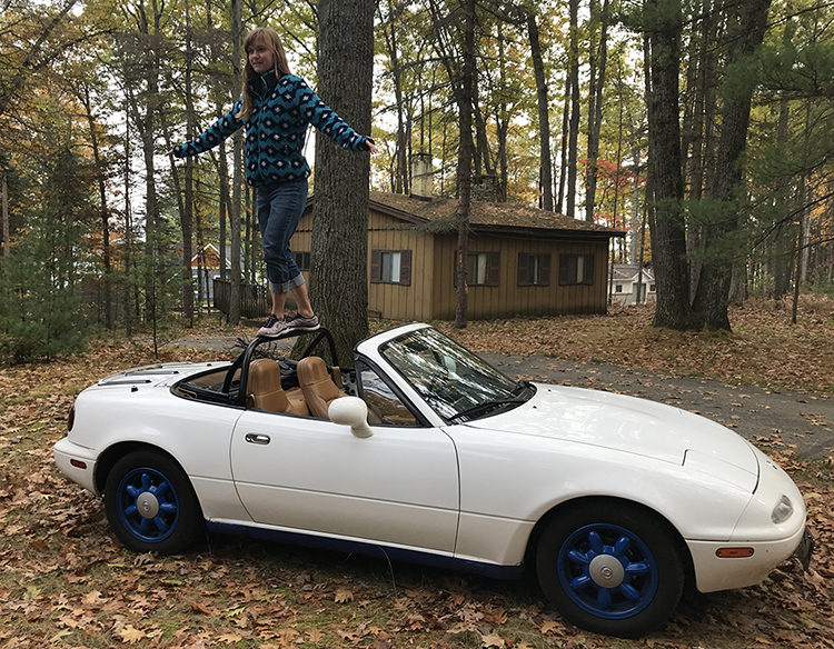 Taylor Tucker and her own convertible.