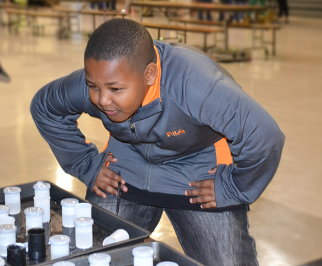 Eleven year-old Jaden waits to see the his geyser erupt.