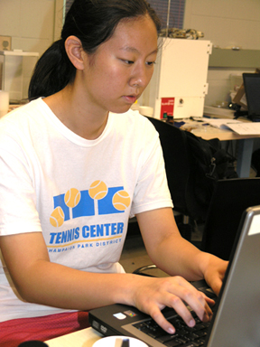 Female student working on computer.