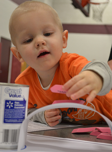 A younger brother who tagged along to Engineering Night discovers a civil engineering principle first-hand: the arch held more erasers.