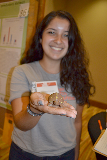 Alondra Estrana, a rising junior in the Department of Natural Resources and Environmental Science, shows off the 3-D printed 