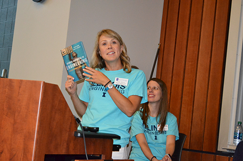 Angie Wolters promotes the  book during the recent WIE Orientation.