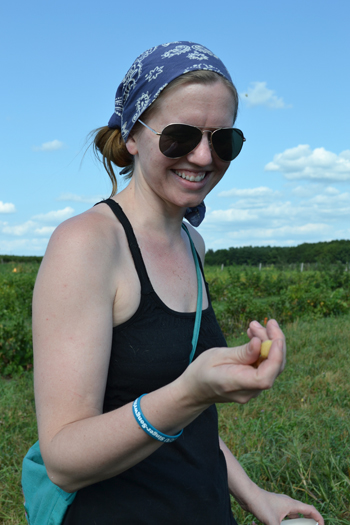 Visitor enjoys the gold raspberries during the WPPR Field Day