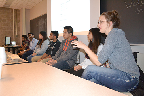 Several Illinois students share during the student panel session.