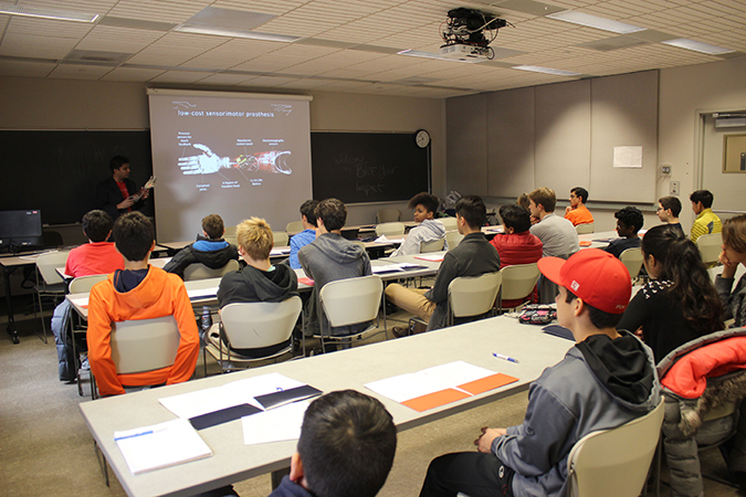 Aadeel Akhtar, Illinois grad student and cofounder of Psyonic, an Illinois Research Park startup company, speaks to students about applications of BioE in the real world. 