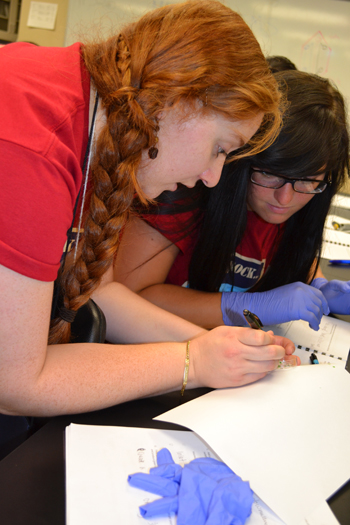 Olivia Cangellaris works with a camper during one of the sessions.