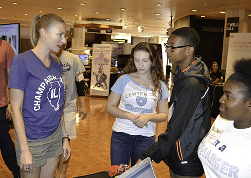 Centennial teacher Lindsay Aikman interacts with her students while setting up for Pygmalion.