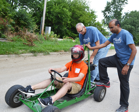 PRI camper on go-cart, PRI scientists 