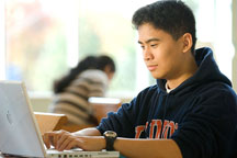 student working on computer